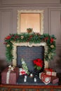 Calm image of interior Classic New Year Tree decorated in a room with fireplace