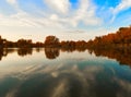 Calm lake in the fall sunset