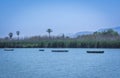 Calm lake with fishing boats. Fresh water lagoon in Estany de cullera. Valencia, Spain Royalty Free Stock Photo