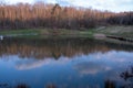 Calm lake with forest reflection Royalty Free Stock Photo