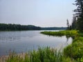 calm lake scene at duck mountain provincial park