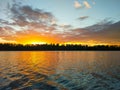 Lake surface at evening in Latvia, East Europe. Landscape with water and forest. Royalty Free Stock Photo