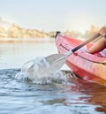 Calm lake, water sport and woman on kayak adventure for summer travel trip canoeing, kayaking and using paddle on river Royalty Free Stock Photo