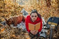 Calm man reading notes and relaxing with dog stock photo Royalty Free Stock Photo