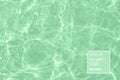 Calm mint colored clear water surface
