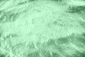 calm mint colored river water surface