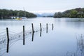 Calm moody evening landscape over Coniston Water in English Lake