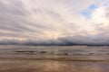 Calm and moody seascape with a dramatic sky before storm.