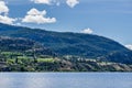 Calm morning lake in British Columbia Canada blue sky with white clouds Royalty Free Stock Photo