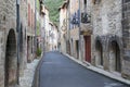 Calm narrow street of the medieval town of Villefranche de Conflent in France.