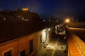 Calm narrow street under the Medicean fortress in the night. Portoferraio, Elba island.