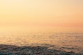 Calm ocean or sea water in beautiful warm sunset colors Royalty Free Stock Photo
