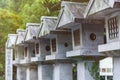 Calm and peaceful green Japanese garden with small stony statues Royalty Free Stock Photo