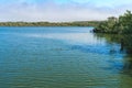 Calm peaceful lake. Oso Flaco Lake Natural area, California. Wetland natural landscape, marsh and lake with ducks Royalty Free Stock Photo