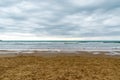 photo of waves on the sea in the surf on a cloudy evening Royalty Free Stock Photo