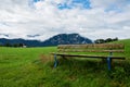 A calm place to rest and relax. An empty wooden bench. Switzerland Royalty Free Stock Photo