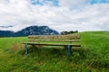 A calm place to rest and relax. An empty wooden bench. Switzerland Royalty Free Stock Photo