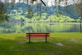 A calm place to rest and relax. An empty wooden bench. Switzerland Royalty Free Stock Photo