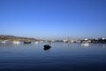 The Greek holiday island of AntiParos. The harbor with small craft moored. A calm and placid sea. Copy space. Royalty Free Stock Photo