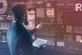 Calm programmer pointing to the screen while noticing an important detail