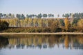 Calm and relaxation emanate from the amazing autumn landscape of the water surface. Royalty Free Stock Photo