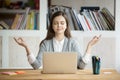 Calm relaxed woman meditating with laptop, no stress at work Royalty Free Stock Photo