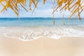 Calm and relaxing empty beach scene, blue sky and white sand.