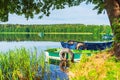 Calm relaxing nature scene. Small wooden boat