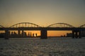 A calm river and an arch bridge and sunset at Hangang Park, Seoul, South Korea Royalty Free Stock Photo