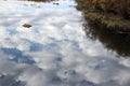 The calm river reflected the beautiful blue sky and white clouds Royalty Free Stock Photo