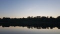 Calm river surface and perfect gradient of sunset