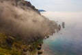 sea bay with rocky coast in a morning mist Royalty Free Stock Photo