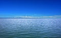 Calm sea and blue clear sky Royalty Free Stock Photo