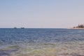 Calm sea, blue water, sky and horizon scene in Tunisia