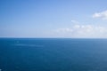 Calm sea, blue water, sky and horizon scene in Tunisia