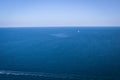 Calm sea, blue water, sky and horizon scene in Tunisia