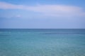 Calm sea, blue water, sky and horizon scene in Tunisia