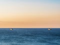 Calm sea and cloudless orange evening sky Royalty Free Stock Photo