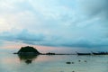 Calm sea at sunset time with islands and boats Royalty Free Stock Photo