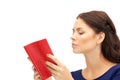 Calm and serious woman with book