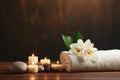 Spa Ambiance with Candle and Orchids Royalty Free Stock Photo