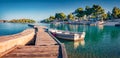 Calm spring view of Ksamil resort. Azure morning seascape of Ionian sea.