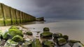 Calm before the storm, dark clouds floating in above the Wadden Sea in the Netherlands. Bad weather is coming at the end of the su Royalty Free Stock Photo