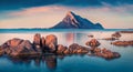 Calm summer view of Sardinia island, Italy, Europe. Wonderful morning scene of Porto Taverna beach with Tavolara mountain on backg