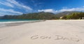 Calm Tropical Beach With Inscription Con Dao Written On A Sand Royalty Free Stock Photo