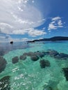 Calm and turquoise water near the Lipe island in Thailand. people are snorkeling