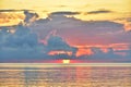 Beautiful sunset over the sea. Colorful sky with clouds and reflections in the water. Royalty Free Stock Photo