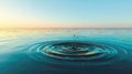 Water Ripples From Drop Falling On Calm Ocean Surface At Sunrise Royalty Free Stock Photo