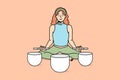 Calm woman meditate with singing bowls