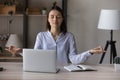 Calm woman meditate at workplace at desk Royalty Free Stock Photo